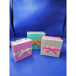 stacked gift boxes, 3 sizes, different designs. all with lids